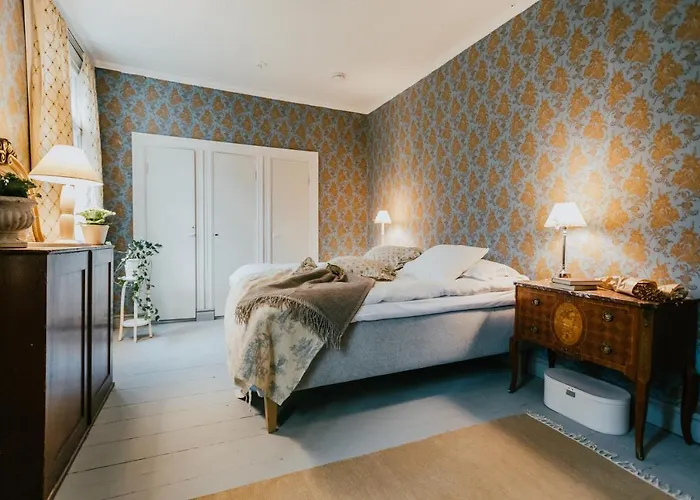 Salaisen Puutarhan Majatalo Mini-hôtel